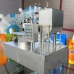 Manual Nozzle Bag Feeding Paste Filling Capping Machine